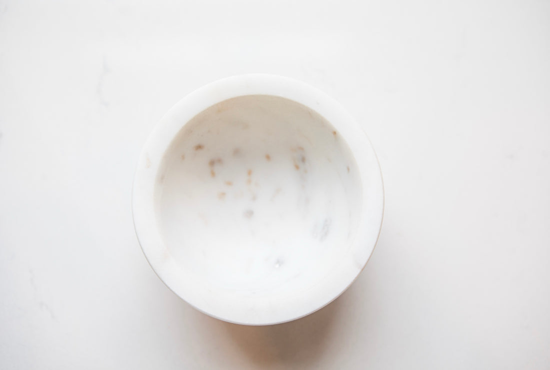White marble bowl on a white background