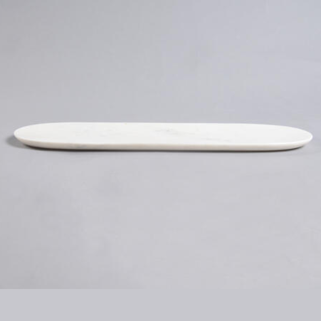 long marble cheese tray on a gray background