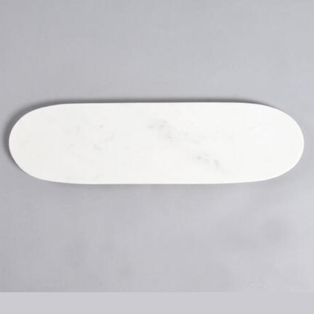 long marble cheese tray on a gray background