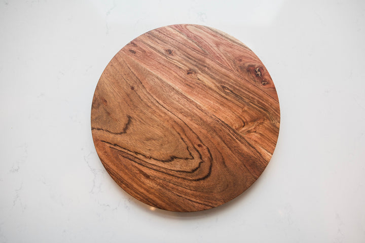 Wooden cutting board on a white background