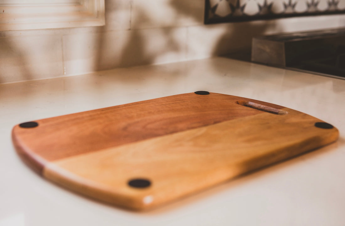 Wooden cutting board on a kitchen counter