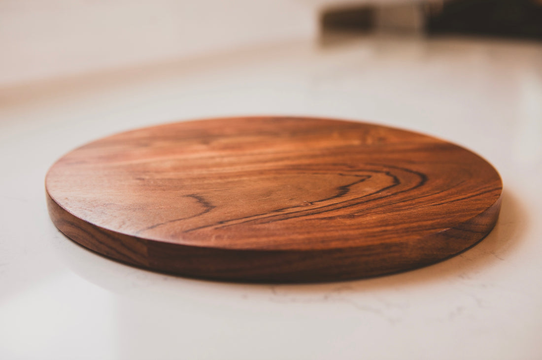 Wooden cutting board on a light surface